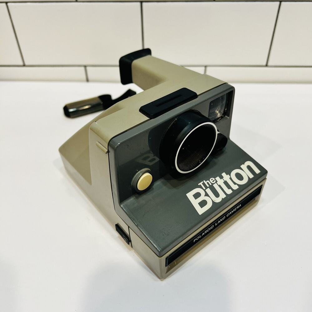 Vintage Polaroid The Button SX-70 Instant Film Land Camera With Strap UNTESTED